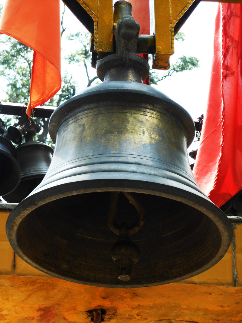 Hanging bell at entrance gate of jhula devi temple
