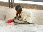 Old Man is Begging outside the Jain Temple.