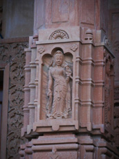 Lady sculpture on the temple wall