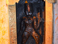 Lord idol at right side entrance gate of chintpurni temple